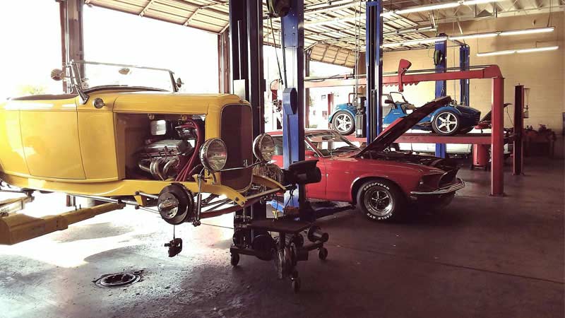 Phoenix mechanic shop with classic cars on lifts for repairs
